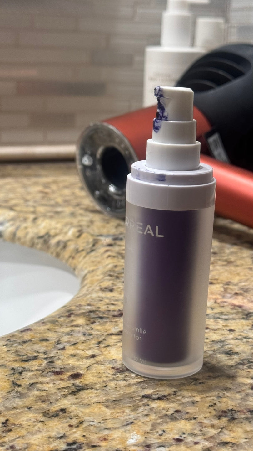 Andrea’s photo of her SURREAL bottle beside the bathroom sink
